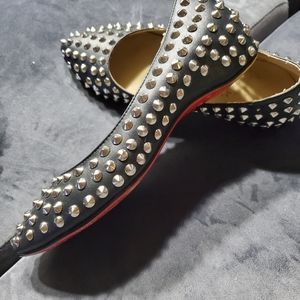 Studded Christian Louboutin flats